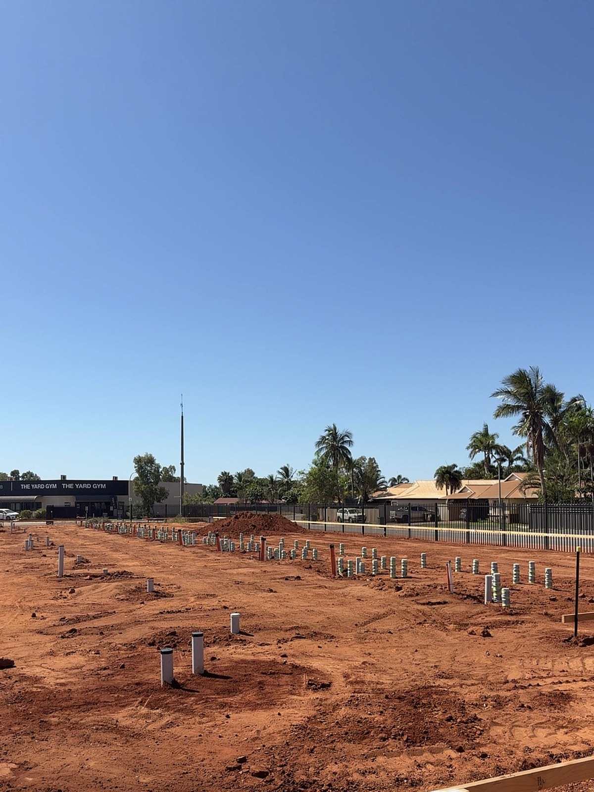 Commercial sewer pipework pre-laid across a concrete slab ready for pour